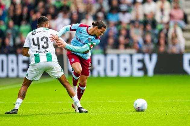 Eredivisie: FC Groningen v Feyenoord Rotterdam Groningen - Marvin Peersman of FC Groningen, Anis Moussa of Feyenoord Rotterdam during the seventh competition round of the 2025 2026 Eredivisie season. The match is set between FC Groningen and Feyenoord Rotterdam at De Euroborg on 28 September 2025 in Groningen, The Netherlands. Copyright: xYannickxVerhoevenx
