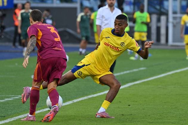 28th September 2025, Stadio Olimpico, Rome, Italy; Serie A Football; Roma versus Hellas Verona; Rafik Belghali of Hellas Verona under pressure from Angelino of AS Roma  AllShotLive
