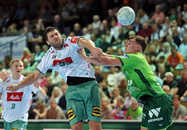 28.09.2025, xovx, Handball Daikin Handball Bundesliga, HSG Wetzlar - GWD Minden v.l. Malte Donker (GWD Minden), Josip Simic (HSG Wetzlar) Wetzlar Buderus-Arena Hessen Deutschland (DE)