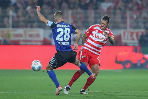 28.09.2025, xtgx, Fussball - 1.Bundesliga Union Berlin - Hamburger SV v.l. Miro Muheim (HSV, 28), Christopher Trimmel (Union Berlin, 28) Zweikampf, Duell, Kampf, tackle (DFL DFB REGULATIONS PROHIBIT ANY USE OF PHOTOGRAPHS as IMAGE SEQUENCES and or QUASI-VIDEO) Berlin