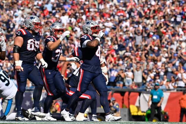 Sep 28, 2025; Foxborough, Massachusetts, USA; New England Patriots running back Antonio Gibson (4) reacts after scoring a touchdown against the Carolina Panthers during the first half at Gillette Stadium, in Foxborough, Massachusetts. CSM Foxborough USA - ZUMAc04_ 20250928_zma_c04_044 Copyright: xEricxCanhax