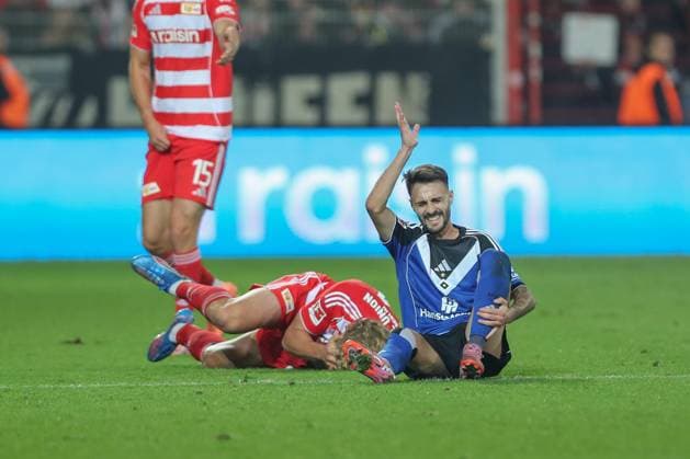 28.09.2025, xtgx, Fussball - 1.Bundesliga Union Berlin - Hamburger SV v.l. Fabio Veira (HSV, 20), Leopold Querfeld (Union Berlin, 14) Zweikampf, Duell, Kampf, tackle (DFL DFB REGULATIONS PROHIBIT ANY USE OF PHOTOGRAPHS as IMAGE SEQUENCES and or QUASI-VIDEO) Berlin