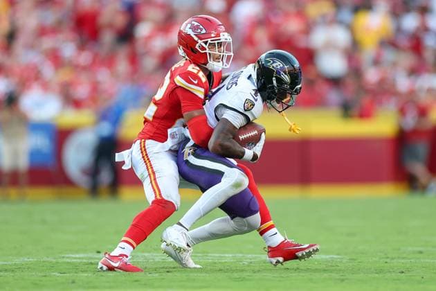 September 28, 2025: Kansas City Chiefs cornerback Trent McDuffie (22) tackles Baltimore Ravens wide receiver Zay Flowers (4) short of a first down for a turnover on downs during the second half of an NFL, American Football Herren, USA football game at GEHA Field at Arrowhead Stadium in Kansas City, MO. CSM Kansas City United States of America - ZUMAc04_ 20250928_zma_c04_204 Copyright: xDavidxSmithx