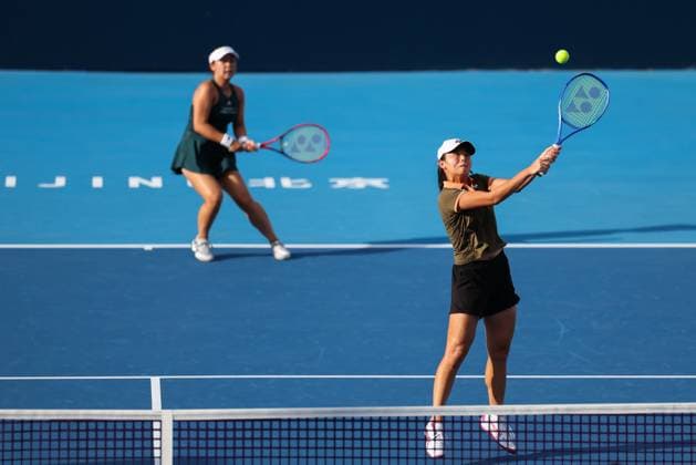 BEIJING, CHINA - SEPTEMBER 29: Eri Hozumi of Japan and Wu Fang-Hsien of Chinese Taipei compete in the Women s Doubles Round of 16 match against Laura Siegemund of Germany and Kamilla Rakhimova on day 8 of the 2025 China Open at National Tennis Center on September 29, 2025 in Beijing, China.  Copyright: xVCGx 111593958372