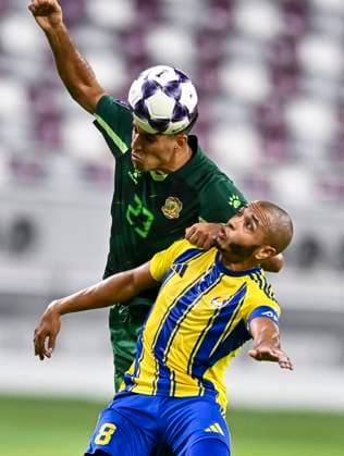 AFC CHAMPIONS LEAGUE ELITE, AL GHARAFA SC (QAT) AL SHORTA (IRQ) Yacine Brahimi (R) of Al Gharafa SC and Ustafa Saadoon of Al Shorta in action during the AFC Champions League elite west football match between Qatar s Al Gharafa SC and IraqÕs Al Shorta at Khalifa International Stadium in Doha, Qatar, on November 29, 2025 DOHA Qatar Copyright: xNAUSHADx