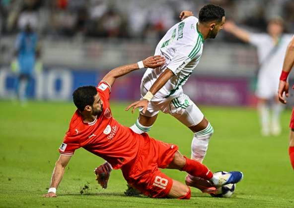 AFC CHAMPIONS LEAGUE ELITE, AL DUHAIL SC (QAT) V AL AHLI SAUDI FC (KSA) Sultan Al-Brake (L) of Al Duhail SC and Riyad Mahrez of Al Ahli Saudi FC in action during the AFC Champions League elite west football match between Qatar s Al Duhail SC and Saudi Arabia s Al Ahli Saudi FC at Abdullah Bin Khalifa Stadium in Doha, Qatar, on September 29, 2025. DOHA Qatar Copyright: xNAUSHADx