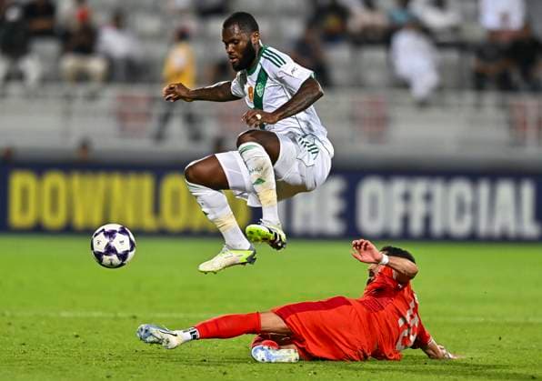 AFC CHAMPIONS LEAGUE ELITE, AL DUHAIL SC (QAT) V AL AHLI SAUDI FC (KSA) Sultan Al-Brake (bottom) of Al Duhail SC and Franck Kessie of Al Ahli Saudi FC in action during the AFC Champions League elite west football match between Qatar s Al Duhail SC and Saudi Arabia s Al Ahli Saudi FC at Abdullah Bin Khalifa Stadium in Doha, Qatar, on September 29, 2025. DOHA Qatar Copyright: xNAUSHADx