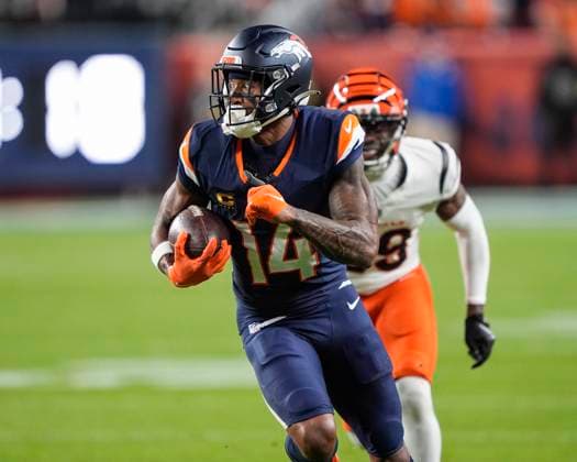 September 29, 2025: Denver Broncos wide receiver Courtland Sutton (14) looks to avoid the hit after a reception in the first half of the football game between the Denver Broncos and Cincinnati Bengals. CSM. - ZUMAc04_ 20250929_zma_c04_036 Copyright: xDerekxRegensburgerx