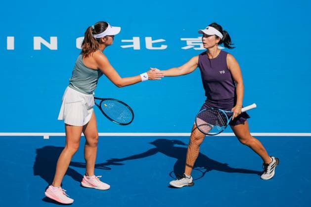 BEIJING, CHINA - SEPTEMBER 30: Xu Yifan and Yang Zhaoxuan of China react in the Women s Doubles Round of 16 match against Timea Babos of Hungary and Luisa Stefani of Brazil on day 9 of the 2025 China Open at the National Tennis Center on September 30, 2025 in Beijing, China.  Copyright: xVCGx 111594164992