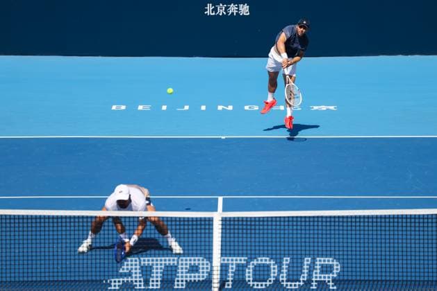 BEIJING, CHINA - SEPTEMBER 30: Benjamin Bonzi of France and Tallon Griekspoor of Netherlands return a shot in the Men s Doubles Semifinal match against Karen Khachanov and Andrey Rublev on day 9 of the 2025 China Open at the National Tennis Center on September 30, 2025 in Beijing, China.  Copyright: xVCGx 111594168839