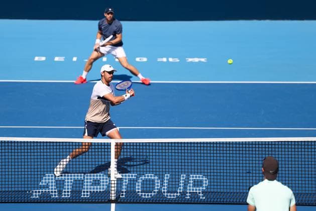 BEIJING, CHINA - SEPTEMBER 30: Benjamin Bonzi of France and Tallon Griekspoor of Netherlands compete in the Men s Doubles Semifinal match against Karen Khachanov and Andrey Rublev on day 9 of the 2025 China Open at the National Tennis Center on September 30, 2025 in Beijing, China.  Copyright: xVCGx 111594178766
