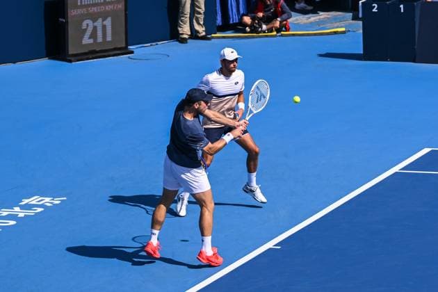 BEIJING, CHINA - SEPTEMBER 30: Benjamin Bonzi of France and Tallon Griekspoor of Netherlands compete in the Men s Doubles Semifinal match against Karen Khachanov and Andrey Rublev on day 9 of the 2025 China Open at the National Tennis Center on September 30, 2025 in Beijing, China.  Copyright: xVCGx 111594176675