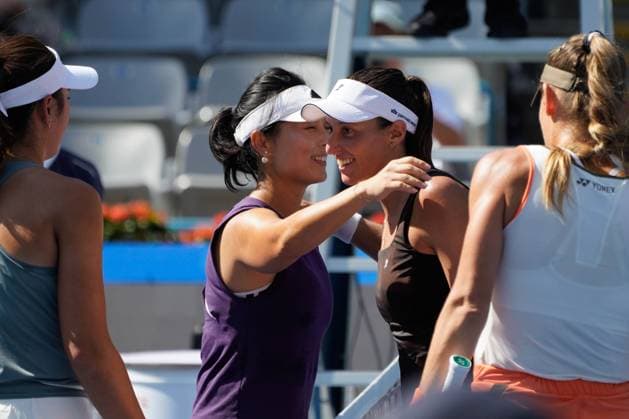 (250930) -- BEIJING, Sept. 30, 2025 -- Xu Yifan(2nd L) Yang Zhaoxuan (1st L) greet Timea Babos (1st R) Luisa Stefani after the women s doubles second round match between Xu Yifan Yang Zhaoxuan of China and Timea Babos of Hungary Luisa Stefani of Brazil at 2025 China Open tennis tournament in Beijing, China, Sept. 30, 2025. ) (SP)CHINA-BEIJING-TENNIS-CHINA OPEN-WOMEN S DOUBLES-SECOND ROUND(CN) XiexHan 