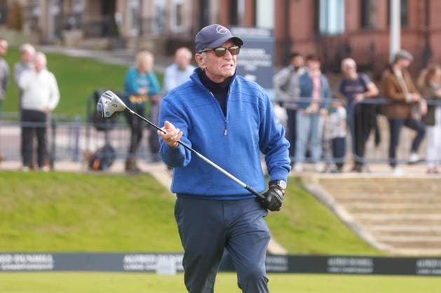 30th September 2025; The Old Course at St Andrews, Fife, Scotland; Alfred Dunhill Links Golf Championship, Practice Round; Actor Michael Douglas watches the flight of his ball from the firs tee of the Old Course, St Andrews during a practice round at the Alfred Dunhill Links Championship  DavidxYoung