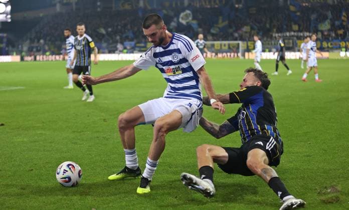 30.09.2025, Fussball, Herren, 3. Liga, Saison 2025 2026, 1. FC Saarbrücken - MSV Duisburg, Rasim Bulic (MSV Duisburg) Patrick Schmidt (1. FC Saarbruecken) Saarbrücken Ludwigsparkstadion Saarland Deutschland (DE) Copyright: xFabianxKleerx