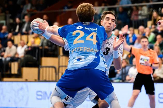 Grosswallstadt: 2.HBL - 25 26 - TV Grosswallstadt - SG BBM Bietigheim v. li. im Zweikampf Ben Connar Battermann (TV Grosswallstadt) und Nikola Vlahovic (Bietigheim) Elsenfeld Untermainhalle Bayern Deutschland