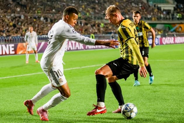 KAZAKHSTAN, ALMATY - SEPTEMBER 30, 2025: Real Madridâ€™s Kylian Mbappe (L) and FC Kairatâ€™s Yegor Sorokin in a 2025-26 UEFA Champions League League Phase Matchday 2 football match between FC Kairat and Real Madrid at Central Stadium. Alikhan Sariyev TASS  84469355
