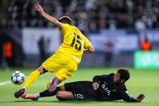 250930 Fredrik Bjorkan of Bodo Glimt and Brennan Johnson of Tottenham Hotspur during the UEFA Champions League football match between Bodo Glimt and Tottenham on September 30, 2025 in Bodo. Photo: Marius Simensen BILDBYRAN COP 238 MM0044 bbeng football fotball fotboll soccer uefa champions league mesterligaen bodo glimt tottenham hotspur spurs Copyright: MARIUSxSIMENSEN BB250930BB838