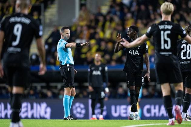 250930 Referee Ivan Kruzliak and Pape Matar Sarr of Tottenham Hotspur during the UEFA Champions League football match between Bodo Glimt and Tottenham on September 30, 2025 in Bodo. Photo: Marius Simensen BILDBYRAN COP 238 MM0044 bbeng football fotball fotboll soccer uefa champions league mesterligaen bodo glimt tottenham hotspur spurs Copyright: MARIUSxSIMENSEN BB250930BB948