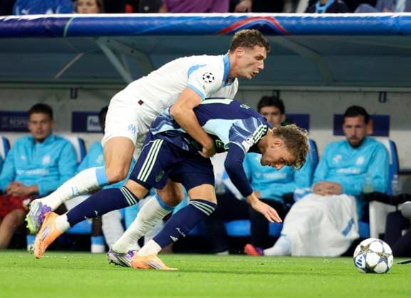 Olympique de Marseille v AFC Ajax - UEFA Champions League 2025 26 League Phase MD2 Benjamin Pavard of Olympique de Marseille and Mika Godts of Ajax challenge during the UEFA Champions League 2025 26 League Phase MD2 match between Olympique de Marseille and AFC Ajax at Stade de Marseille on September 30, 2025 in Marseille, France. Marseille Stade de Marseille France France Copyright: xNealxSimpson Sportsphoto APLx 14136623