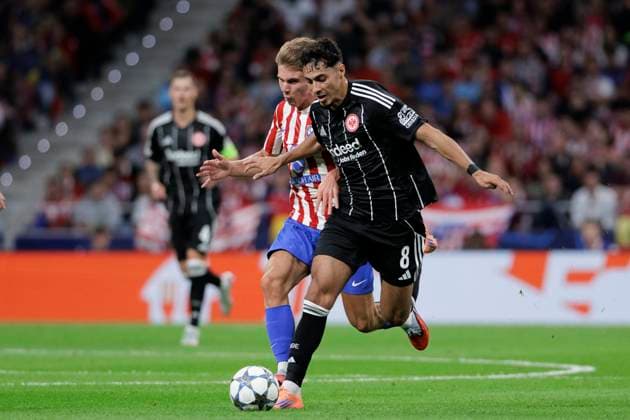 UEFA champions league - Atletico de Madrid vs Eintracht MADRID,SPAIN - 30 September: Fares Chaibi of Eintracht Frankfurt and Pablo Barrios of Atletico de Madrid fight for the ball during UEFA champions league 2025 26 match between Atletico de Madrid and Eintracht at Riyadh Air Metropolitano Stadium. (Photo by Guillermo Martinez) Madrid Riyadh Air Metropolitano Stadium Spain Copyright: xGuillermoxMartinezx