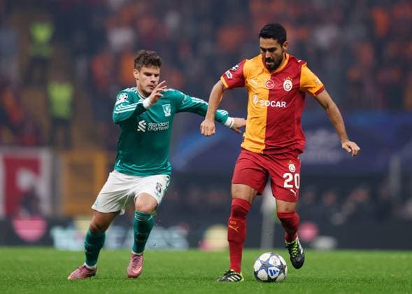 Ilkay Gündogan of Galatasaray is challenged by Milos Kerkez of Liverpool Galatasaray v Liverpool, UEFA Champions League, Group Stage, Football, RAMS Park, Istanbul, Turkey - 30 Sep 2025Istanbul RAMS Park Turkey EDITORIAL USE ONLY No use with unauthorised audio, video, data, fixture lists, club league logos or live services. Online in-match use limited to 120 images, no video emulation. No use in betting, games or single club league player publications. Copyright: xRaddadxJebarah Shutterstockx 15504034bh