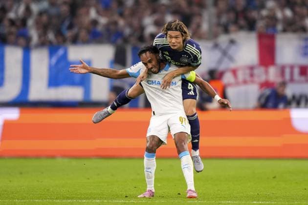 MARSEILLE , 30-09-2025 , Stade Velodrome , season 2025 2026 , UEFA Champions League football , League phase Matchday 2 , match between Olympique de Marseille and Ajax , picture shows Ajax player Ko Itakura and Olympique de Marseille player Pierre-Emerick Aubameyang Olympique de Marseille - Ajax  x31296948x Copyright: