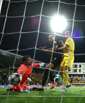Jostein Gundersen of Bodo Glimt scores an own goal under pressure from Richarlison of Tottenham Hotspur FK Bodo Glimt v Tottenham Hotspur, UEFA Champions League, Group Stage, Football, Aspmyra Stadion, Bodo, Norway - 30 Sep 2025Bodo Aspmyra Stadion Norway EDITORIAL USE ONLY No use with unauthorised audio, video, data, fixture lists, club league logos or live services. Online in-match use limited to 120 images, no video emulation. No use in betting, games or single club league player publications. Copyright: xMichaelxZemanek Shutterstockx 15504026ar