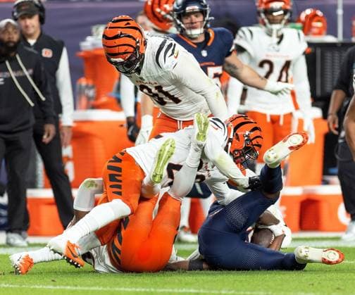 September 30, 2025, Denver, Colorado, USA: Broncos WR MARVIN MIMS JR. gets tackled by several Bengal Defenders after a catch during the 1st. Half at Empower Field at Mile High Monday night. Broncos beat the Bengals 28-3. Denver USA - ZUMAav4_ 20250930_zaf_av4_024 Copyright: xHectorxAcevedox