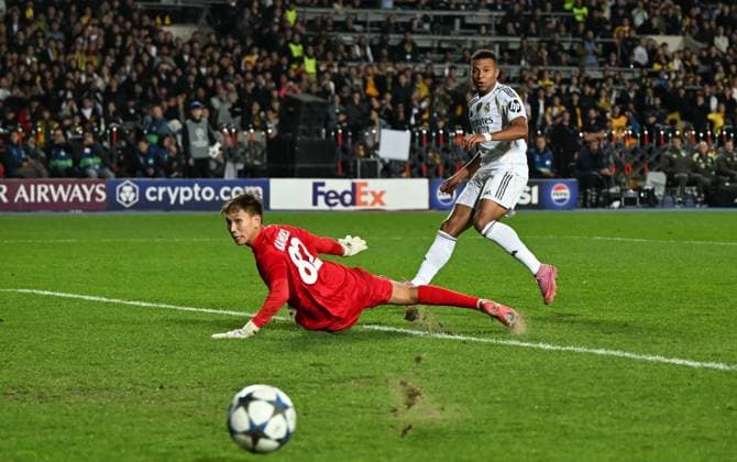 (251001) -- ALMATY, Oct. 1, 2025 -- Kylian Mbappe (R)of Real Madrid shoots during the UEFA Champions League match between Kairat Almaty and Real Madrid in Almaty, Kazakhstan, on Sept. 30, 2025. ) (SP)KAZAKHSTAN-ALMATY-FOOTBALL-UEFA CHAMPIONS LEAGUE-KAIRAT ALMATY VS REAL MADRID LixRenzi 