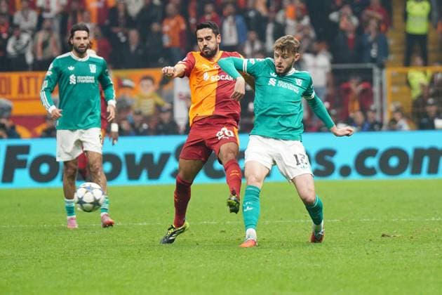 Ilkay Gundogan (L) of Galatasaray and Conor Bradley (12)of Liverpool battle for the ball during the UEFA Champions League 2025 26 League Phase MD2 match between Galatasaray A.S. and Liverpool FC at Rams Park Stadium on September 30, 2025 in Istanbul, Turkey. (Photo by Seskimphoto ) 