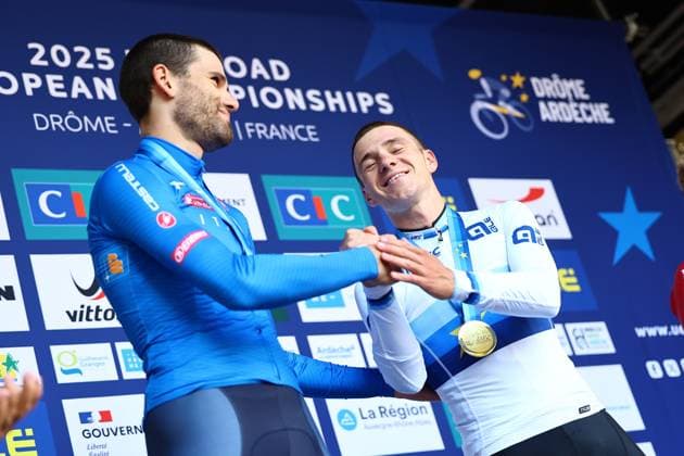 L-R, Italian Filippo Ganna and Belgian Remco Evenepoel celebrate on the podium of the 24 km time trial of the Men Elite category at the UEC road European cycling championships, Wednesday 01 October 2025, in Loriol-sur-Drome, France. The European cycling championships Drome-Ardeche takes place from 1 to 5 October, France. DAVIDxPINTENS  x135838114x
