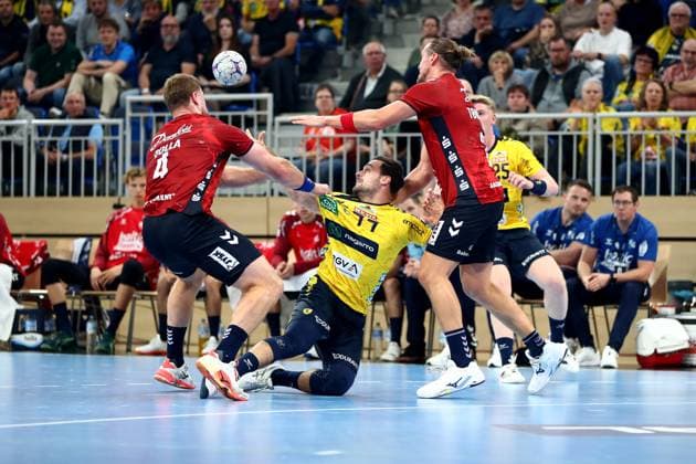 01.10.2025, xmohx, Handball DHB Pokal, Rhein Neckar Loewen - SG Flensburg-Handewitt v.l. Johannes Golla (SG Flensburg-Handewitt) Dani Baijens (Rhein Neckar Loewen) Kent Robin Tonnesen (SG Flensburg-Handewitt) (DFL DFB REGULATIONS PROHIBIT ANY USE OF PHOTOGRAPHS as IMAGE SEQUENCES and or QUASI-VIDEO) Heidelberg