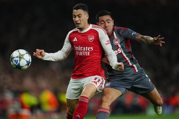 Gabriel Martinelli of Arsenal and Francisco Ortega of Olympiakos Arsenal v Olympiakos, UEFA Champions League, Group Stage, Football, Emirates Stadium, London, UK - 01 Oct 2025London Emirates Stadium United Kingdom EDITORIAL USE ONLY No use with unauthorised audio, video, data, fixture lists, club league logos or live services. Online in-match use limited to 120 images, no video emulation. No use in betting, games or single club league player publications.  Copyright: xJoexToth Shutterstockx 15504044o