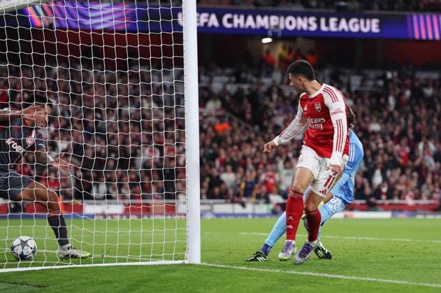 London, England, 1st October 2025. Gabriel Martinelli of Arsenal scores their first goal during the Arsenal vs Olympiacos UEFA Champions League match at the Emirates Stadium, London. Picture credit should read: David Klein Sportimage EDITORIAL USE ONLY. No use with unauthorised audio, video, data, fixture lists, club league logos or live services. Online in-match use limited to 120 images, no video emulation. No use in betting, games or single club league player publications. SPI_020_DK_Arsenal_Olympiakos SPI-4186-0021