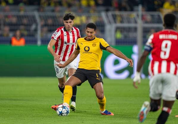 Zweikampf zwischen: Jobe BELLINGHAM (Borussia Dortmund, 7) und Alejandro Rego (Athletic Bilbao, 30) 01.10.2025, Borussia Dortmund - Athletic Bilbao, Fussball, UEFA Champions League - MD2, Saison 2025 2026 DFL regulations prohibit any use of photographs as image sequences and or quasi-video. Copyright: HMBxMedia xMarcoxBader