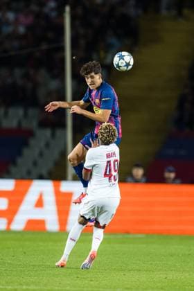 Spain-Football-Champions League-Group Stage FC Barcelona, Barca v PSG in Barcelona, Spain. Barcelona, Spain, 1, October, 2025. FC Barcelona player (5) Pau Cubarsi head shot with (49) Ibrahim Mbaye during Champions League match between FC Barcelona and PSG in Olympic Stadium Lluis Companys, Barcelona, Spain, on October 1, 2025. Barcelona Olympic Stadium Lluis Companys Barcelona Spain