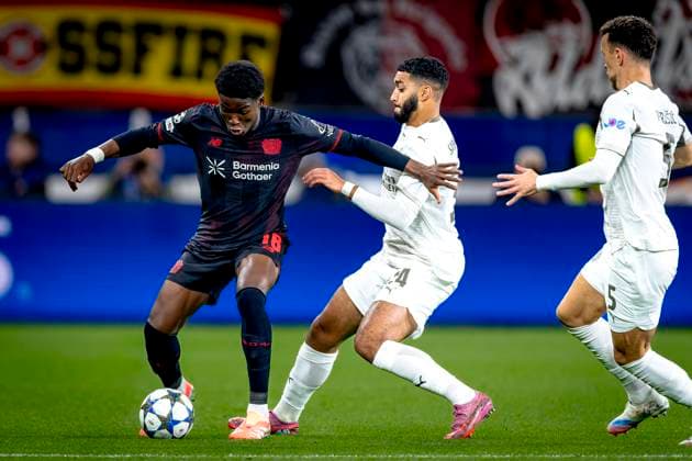 Bayer 04 Leverkusen defender Axel Tape, PSV Eindhoven midfielder Ismael Saibari during the match Bayer 04 Leverkusen vs PSV Eindhoven at the Bay Arena for the Champions League - League phase - Matchday 2 season 2025-2026 in LEVERKUSEN, Germany on 20 september 2025, (photo by Marcel van Dorst EYE4images DeFodi Images) Bayer 04 Leverkusen defender Axel Tape, PSV Eindhoven midfielder Ismael Saibari during the match Bayer 04 Leverkusen vs PSV Eindhoven at the Bay Arena for the Champions League League phase Matchday 2 season 2025 2026 in LEVERKUSEN, Germany on 20 september 2025, photo by Marcel van Dorst EYE4images DeFodi Images