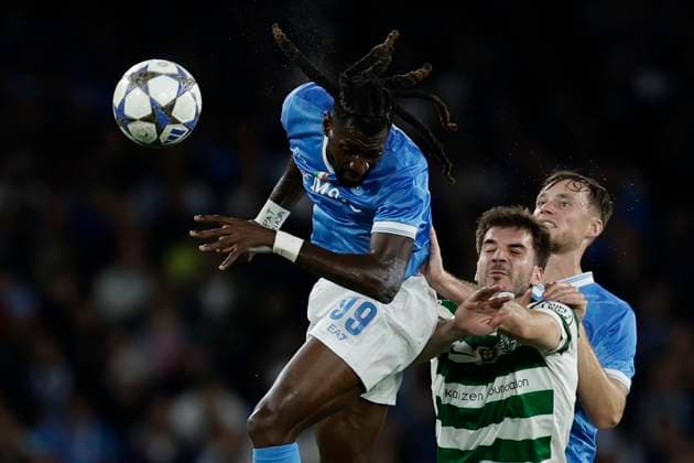 Champions League match SSC Napoli vs Sporting Clube de Portugal Napoli s Cameroonian midfielder Andre Frank Zambo Anguissa challenges for the ball with Sporting s Greek forward Fotis Ioannidis during the Uefa champions league match between SSC Napoli vs Sporting Clube de Portugal at the Diego Armando Maradona Stadium in Naples on October 1, 2025. _BPH9858 Copyright: xAntonioxBalascox