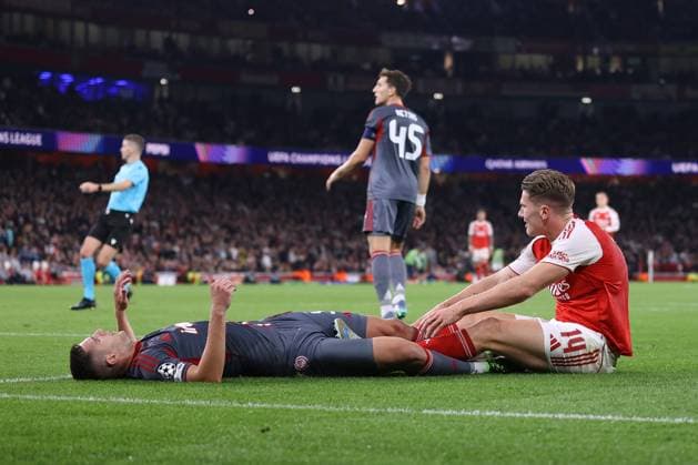 Arsenal v Olympiacos 01 October 2025, London - UEFA Champions League - Arsenal v Olympiacos - Lorenzo Pirola of Olympiacos and Viktor Gyokeres of Arsenal - Photo: Jacques Feeney Offside. London UK Copyright: xJacquesxFeeneyx xOffsidexOffside