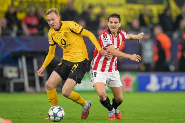 Fußball, Championsleague, 20251001, BV Borussia Dortmund - Athletic Bilbao. Im Bild v.l. Maximilian BEIER (Dortmund, 14), Inigo RUIZ DE GALARRETA (Bilbao, 16) Zweikampf Ball. Dortmund Signal Iduna Park Nordrhein-Westfalen Deutschland Copyright: Passion2Press MarkusxFischerx