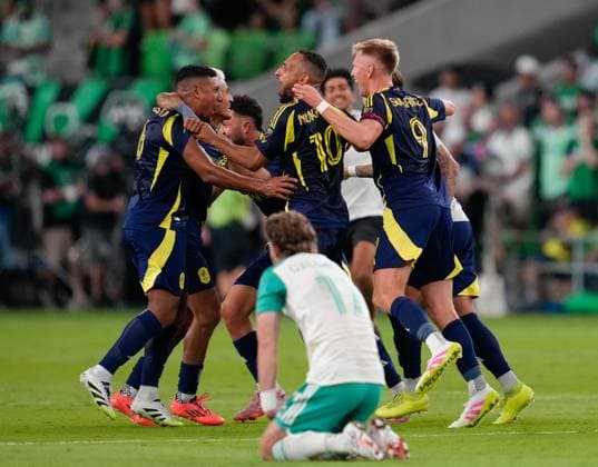 October 1, 2025, Austin, Texas, USA: Nashville SC players celebrate as Austin FC defender JON GALLAGHER (17) looks on after the Lamar Hunt US Open Cup Final between Austin FC and Nashville SC, on October 1, 2025, in Austin, Texas. Nashville won, 2-1. Austin USA - ZUMAc201 20251001_zap_c201_030 Copyright: xScottxColemanx