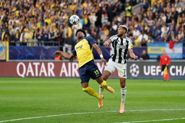 Kevin Rodriguez of Union SG clears from Joelinton of Newcastle Union St Gilloise v Newcastle, UEFA Champions League, Group Stage, Football, Lotto Park, Brussels, Belgium - 01 Oct 2025Brussels Lotto Park Belgium EDITORIAL USE ONLY No use with unauthorised audio, video, data, fixture lists, club league logos or live services. Online in-match use limited to 120 images, no video emulation. No use in betting, games or single club league player publications. Copyright: xDavidxWinter Shutterstockx 15504048jb
