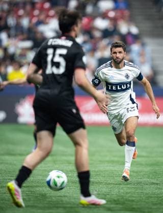 October 1, 2025, Vancouver, Bc, CANADA: Vancouver Whitecaps Thomas Muller (13) runs to the ball as Vancouver FC s Aidan O Connor (15) defends during the second half of the Canadian Championship final soccer match, in Vancouver, on Wednesday, October 1, 2025. Canada News - October 1, 2025  - ZUMAc35_ 20251001_zaf_c35_199 Copyright: xEthanxCairnsx
