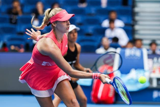 BEIJING, CHINA - OCTOBER 02: Miyu Kato of Japan and Fanny Stollar of Hungary compete in the Women s Doubles Quarterfinal match against Timea Babos of Hungary and Luisa Stefani of Brazil on day 11 of the 2025 China Open at the National Tennis Center on October 2, 2025 in Beijing, China.  Copyright: xVCGx 111594594625