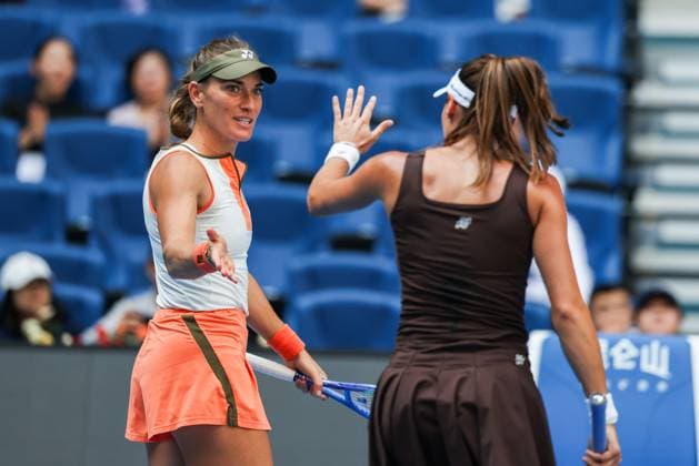 BEIJING, CHINA - OCTOBER 02: Timea Babos of Hungary and Luisa Stefani of Brazil react in the Women s Doubles Quarterfinal match against Miyu Kato of Japan and Fanny Stollar of Hungary on day 11 of the 2025 China Open at the National Tennis Center on October 2, 2025 in Beijing, China.  Copyright: xVCGx 111594593195