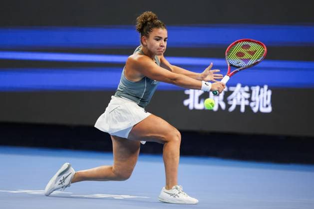 BEIJING, CHINA - OCTOBER 02: Jasmine Paolini of Italy competes in the Women s Singles Quarterfinal match against Amanda Anisimova of the United States on day 11 of the 2025 China Open at the National Tennis Center on October 2, 2025 in Beijing, China.  Copyright: xVCGx 111594637018