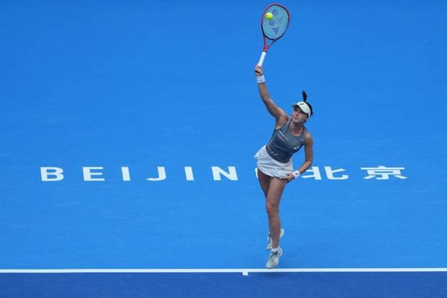 (251002) -- BEIJING, Oct. 2, 2025 -- Eva Lys serves during the women s singles quarterfinal match between Coco Gauff of the United States and Eva Lys of Germany at 2025 China Open tennis tournament in Beijing, China, Oct. 2, 2025. ) (SP)CHINA-BEIJING-TENNIS-CHINA OPEN-WOMEN S SINGLES (CN) XiexHan 
