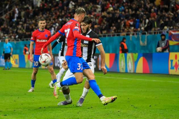 October 2, 2025, UEFA EUROPA LEAGUE, League phase, Matchday 2, FCSB vs Young Boys, Bucharest, National Arena Stadium 3 Jaouen Hadjam dribbles the opponent in speed and 37 Octavian Popescu trise to stop him