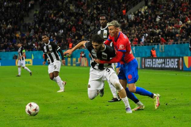 October 2, 2025, UEFA EUROPA LEAGUE, League phase, Matchday 2, FCSB vs Young Boys, Bucharest, National Arena Stadium 37 Octavian Popescu puts in a tackle on 3 Jaouen Hadjam